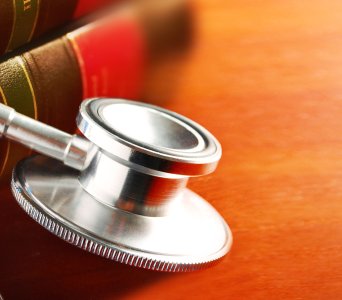 Stethoscope with Medical Books - MedMal